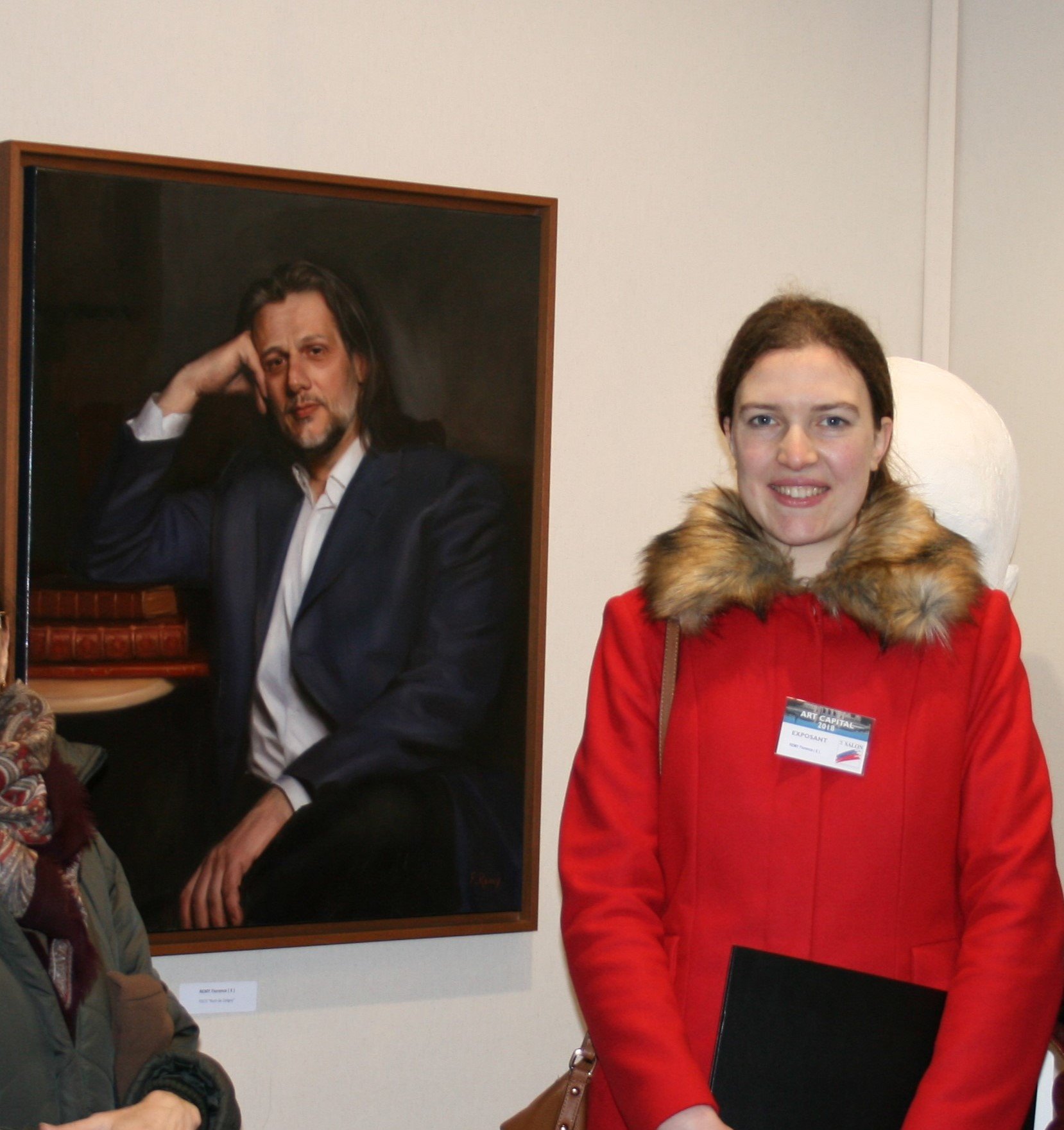 Florence Remy with the portrait of Roch de Coligny